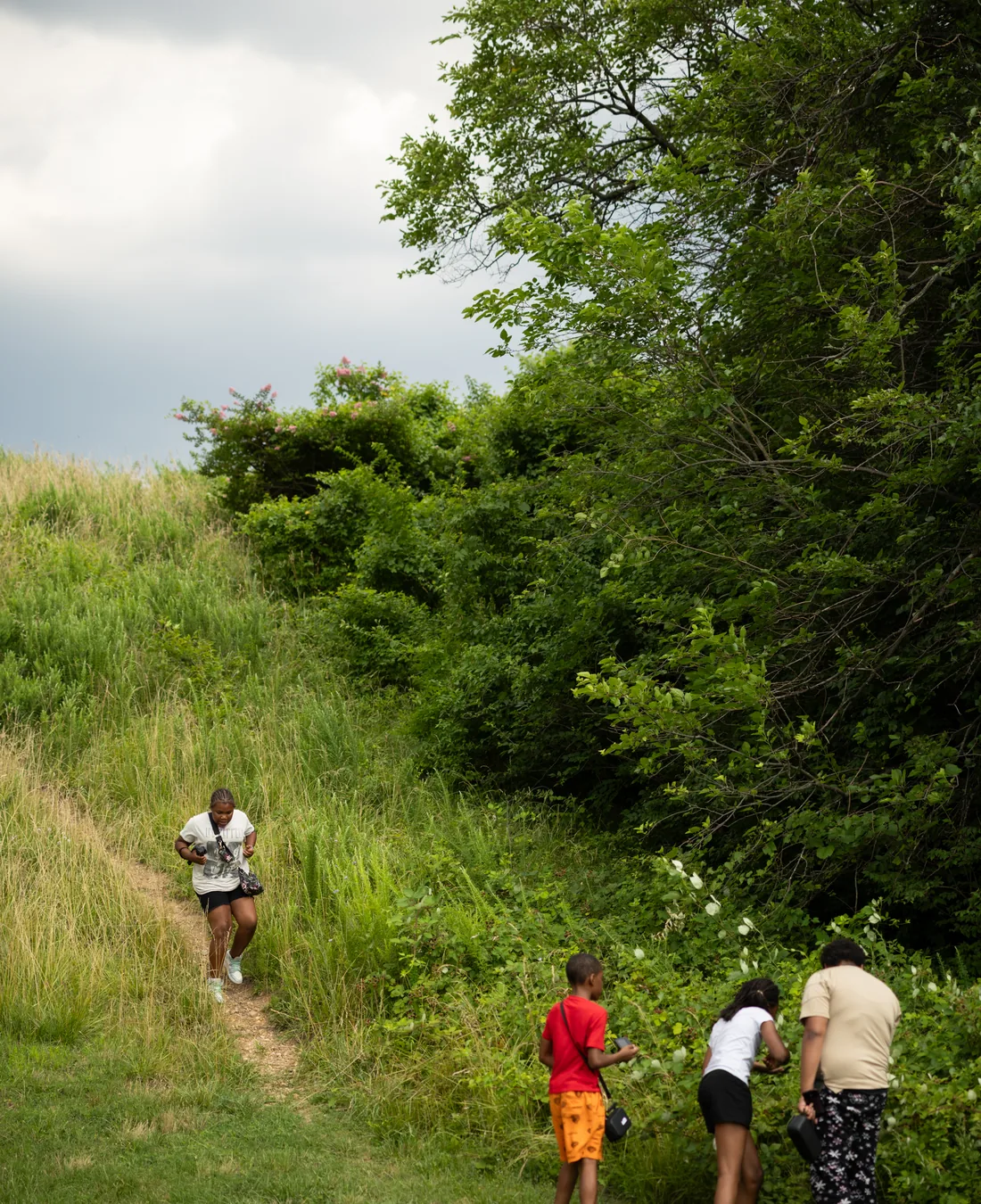 Young people participating in an outdoor learning experience during Crowns programming.