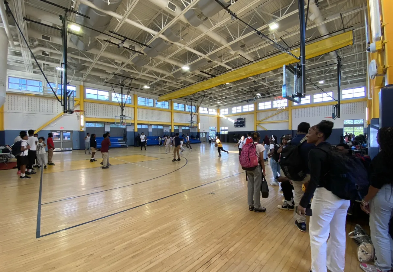 Students gathered in a school gym during a Crowns-supported school culture event.
